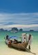 Thailand: Visitors buying snacks from one of the food boats lined up on the beach at Hat Tham Phra Nang, Krabi Coast